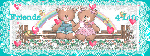 two bears sitting on a bench