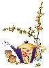 Tea pot, two cups and floral arrangement