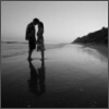 black & white beach kiss