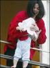 michael jackson throwing a poor baby 