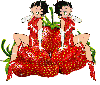 2 Betty Boops in red sitting on strawberries